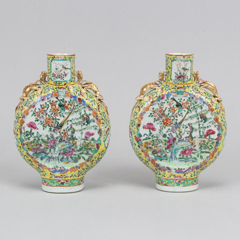 A pair of famille rose Canton moon flasks, late Qing dynasty, 19th Century.