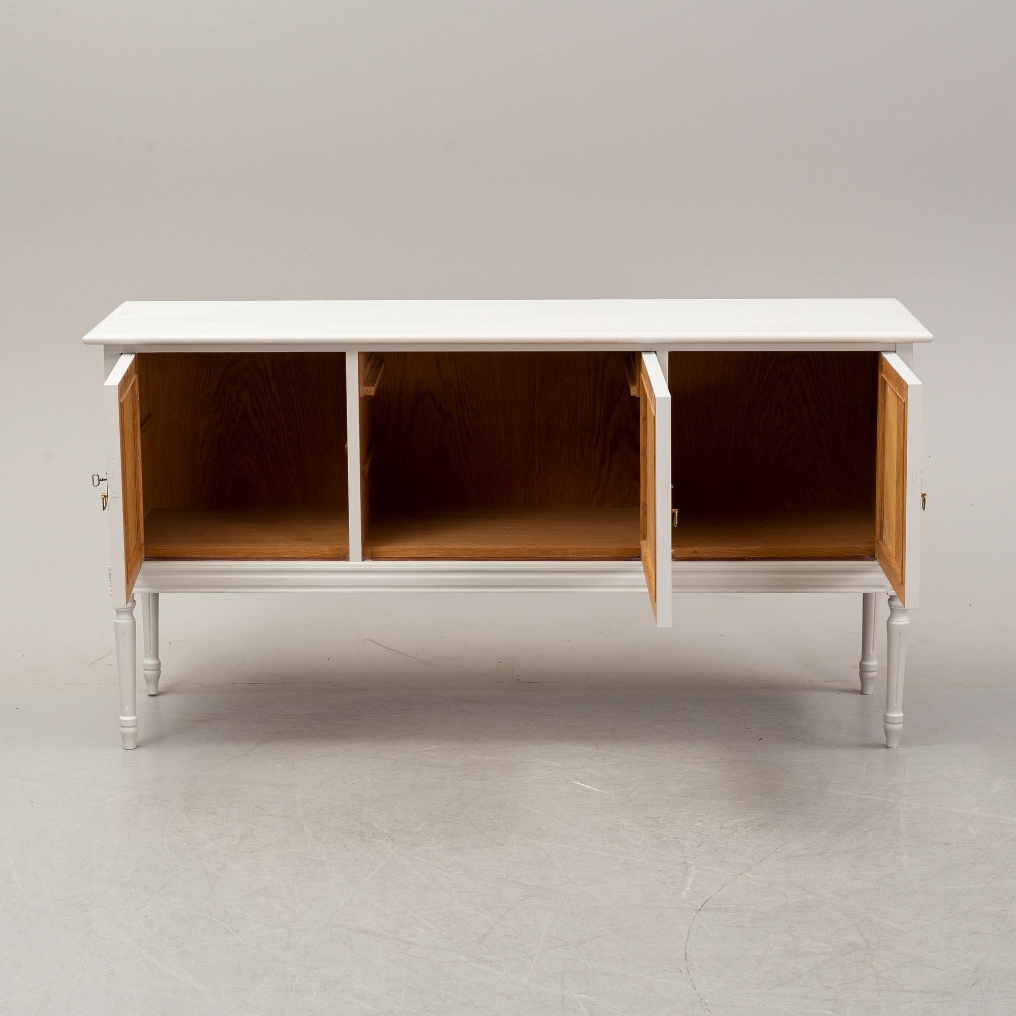 A painted Gustavian style sideboard, second half of the 20th Century.