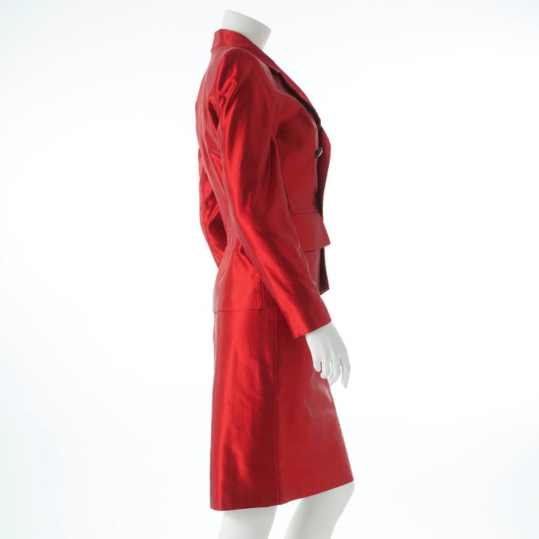 YVES SAINT LAURENT, a two-piece silk suit consisting of jacket and skirt.