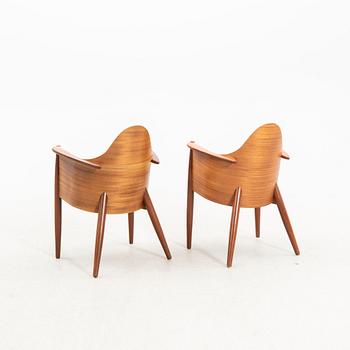 A pair of mahogany chairs, designed by Klaus Wettergren for Q Production Denmark, 1980s.