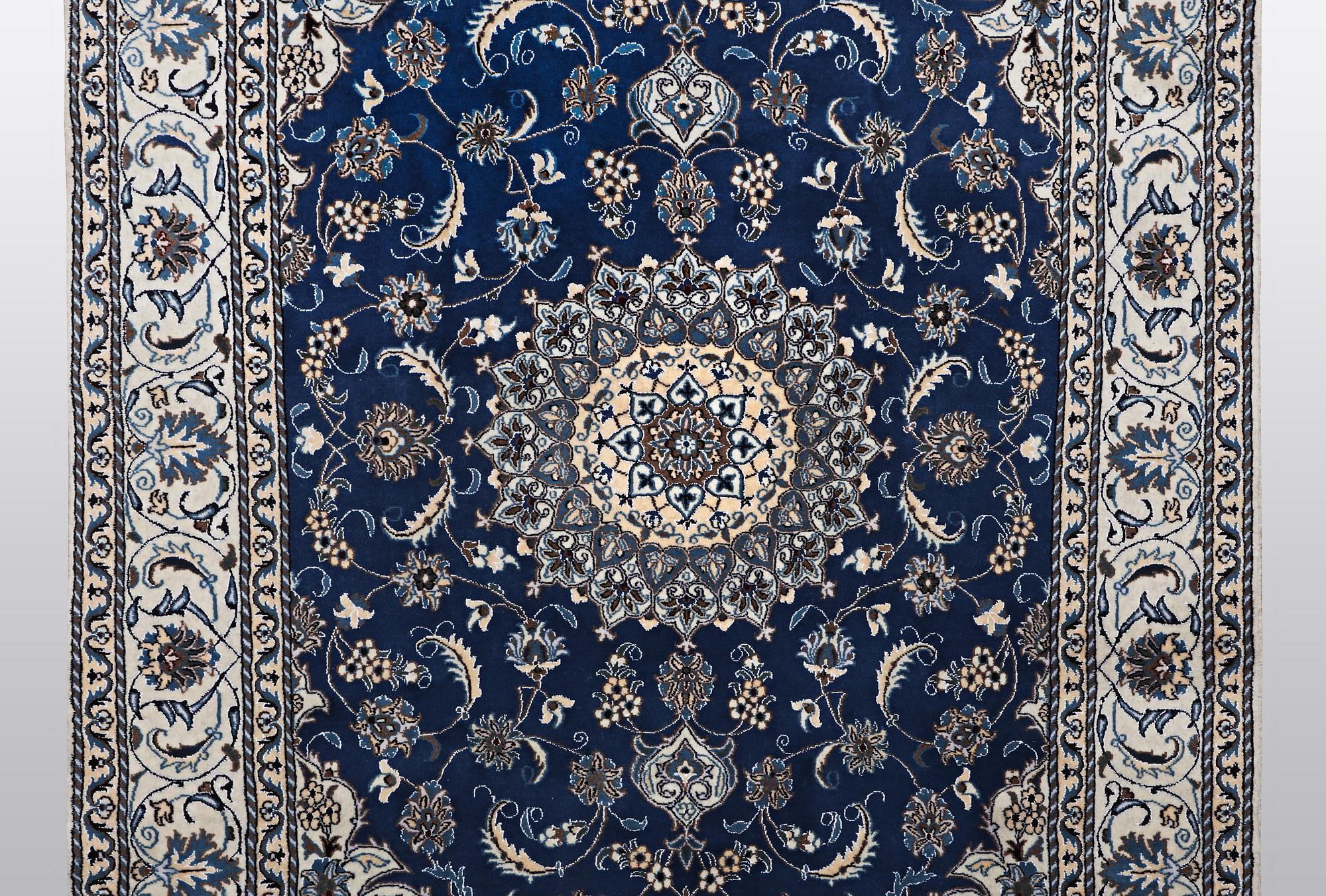 A carpet, Nain, part silk 9 LAA, ca 310 x 203 cm.