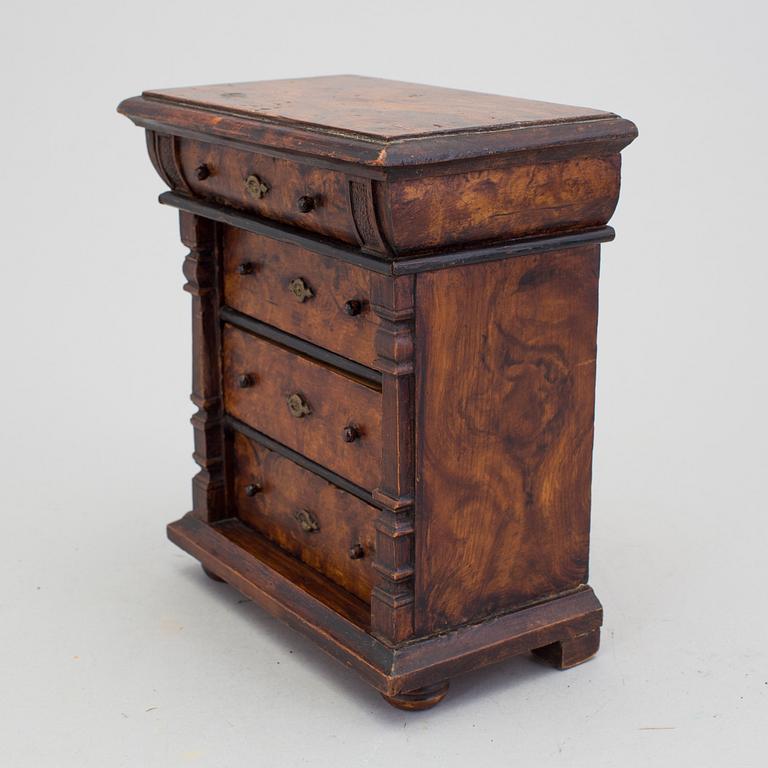 A neo-renaissance miniature chest of drawers late 19th century.