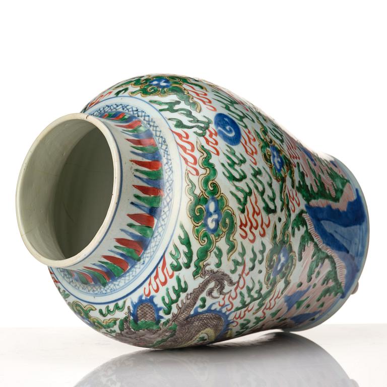 A matched pair of Transitional Wucai jars, 17th Century.