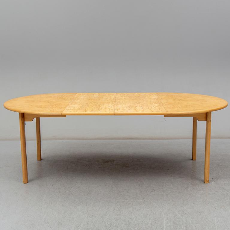 a 'Svitjod' dining table by Göran Malmvall for Karl Andersson & söner.