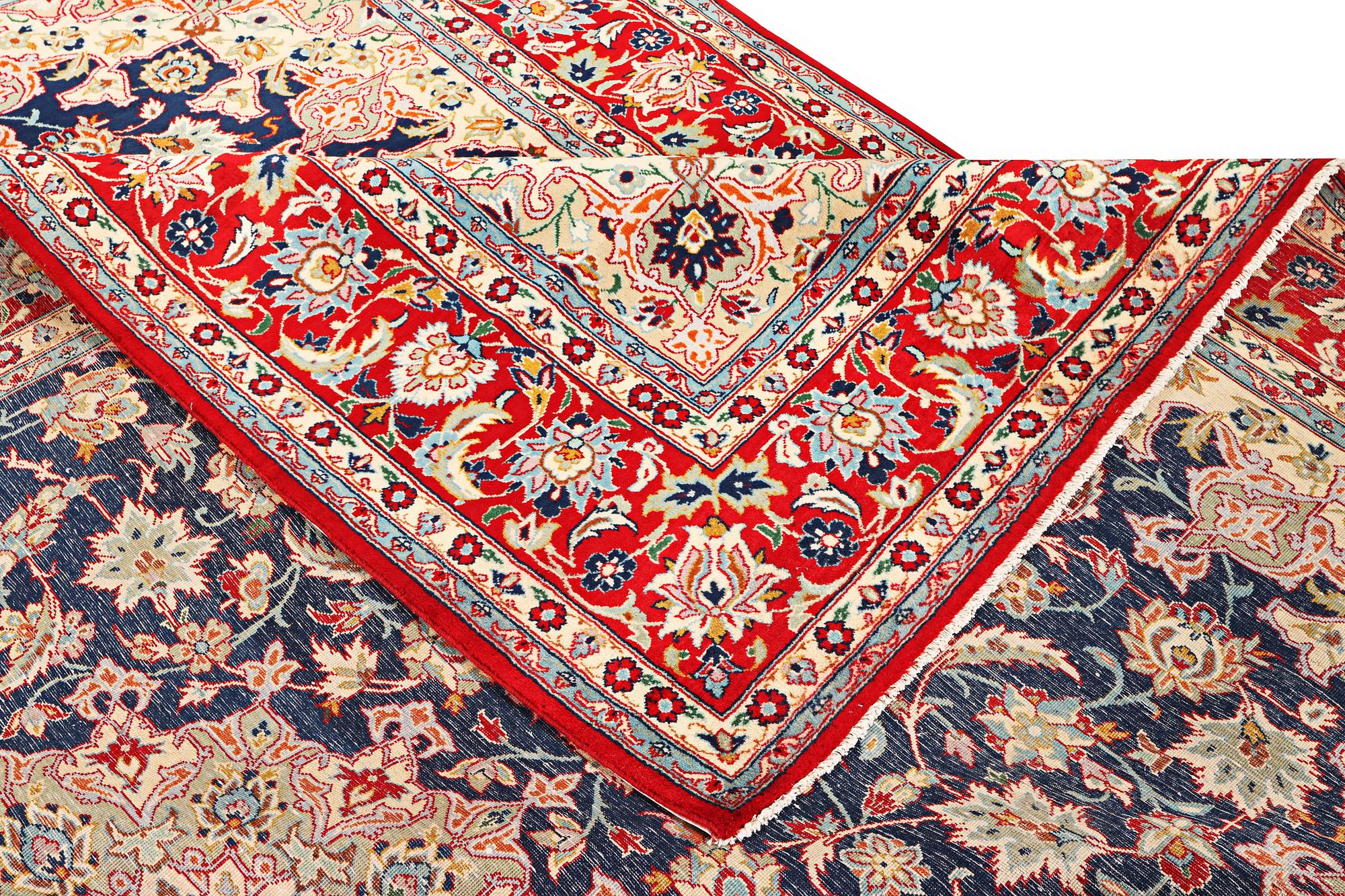 A Kashan carpet, a. 365 x 257 cm.