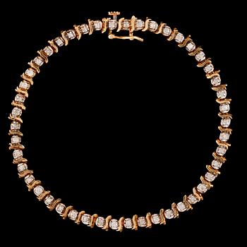 ARMBAND, sk tennisarmband, 14k guld med diamanter tot ca0,46ct. Vikt 5,7g.