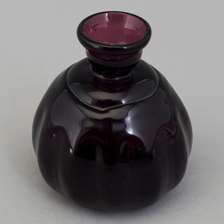A 18th century glass ink-bottle.