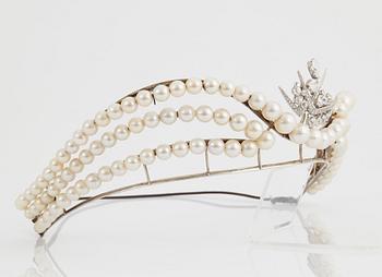 A tiara with cultured pearls and a detachable WA Bolin platinum brooch set with old-cut diamonds.