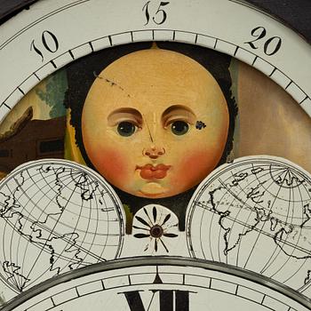 A long-case clock, England, 19th century.