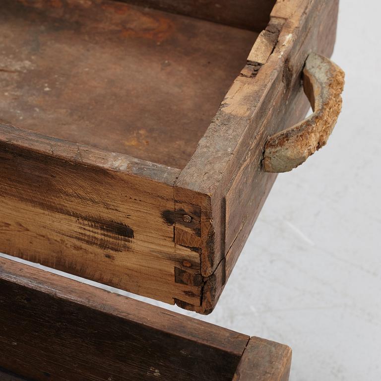 A carved oak chest with wrought iron fittings, 19th Century.