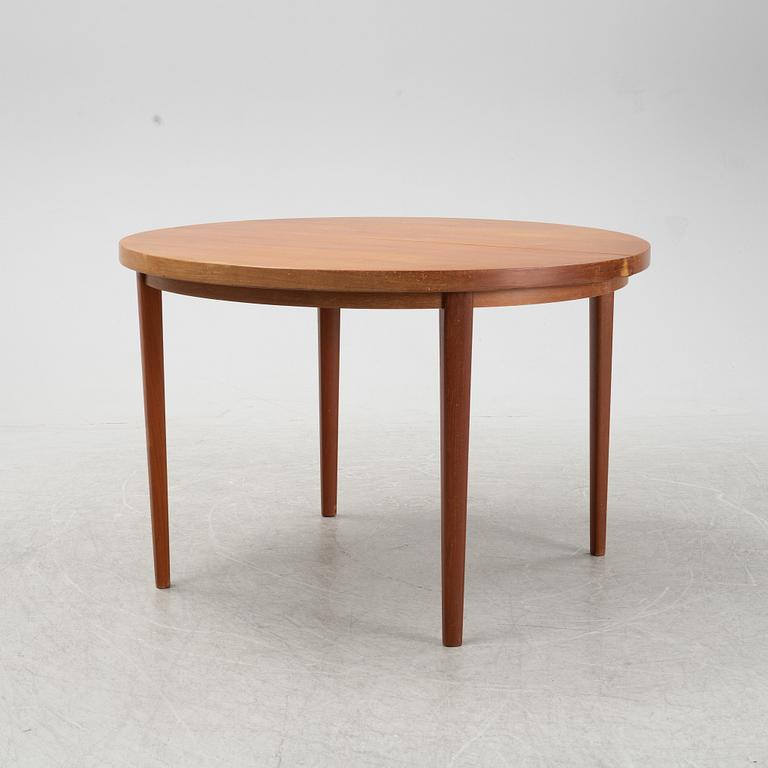 A five-piece teak and oak dining suite, second half of the 20th Century.