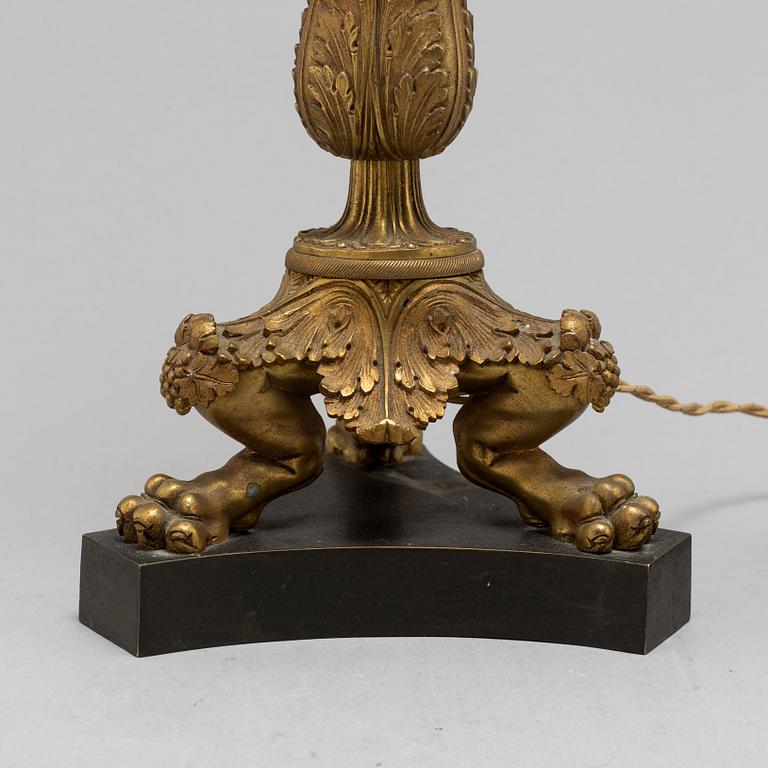 A LATE EMPIRE BRONZE TABLE LAMP, mid 19th century.
