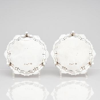 A pair of English silver salvers/plates, marks of Thomas Cooke II and Richard Gurney, London 1753.