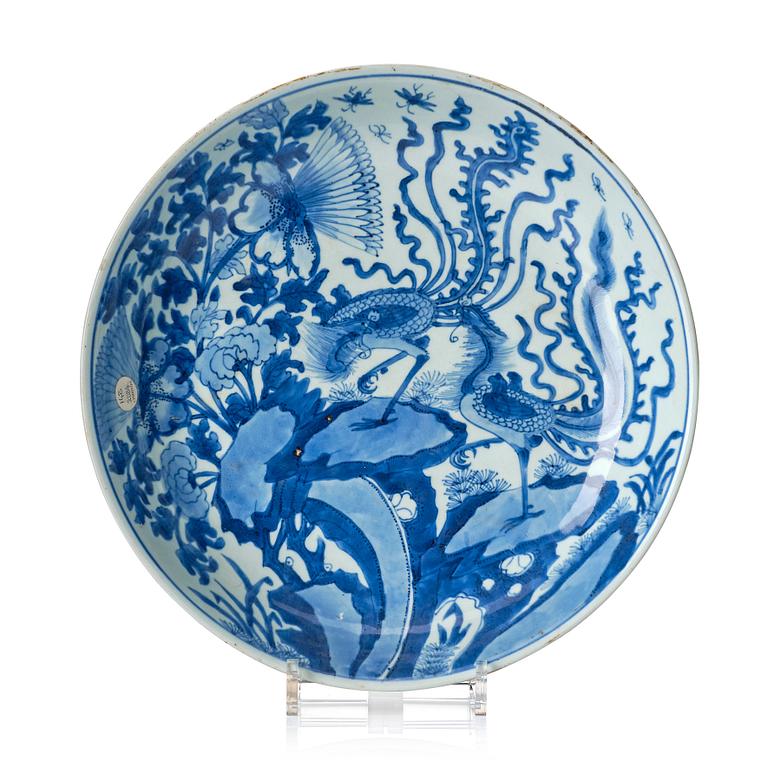 A blue and white 'phoenix and peony' dish, Qing dynasty, Kangxi (1662-1722).
