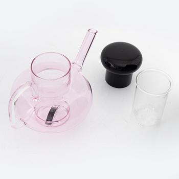 Tom Dixon, A 'Bump' glass teapot with for cups and a pair of glasses.