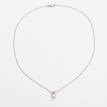 A 14K white gold necklace with a ca. 0.93 ct diamond.