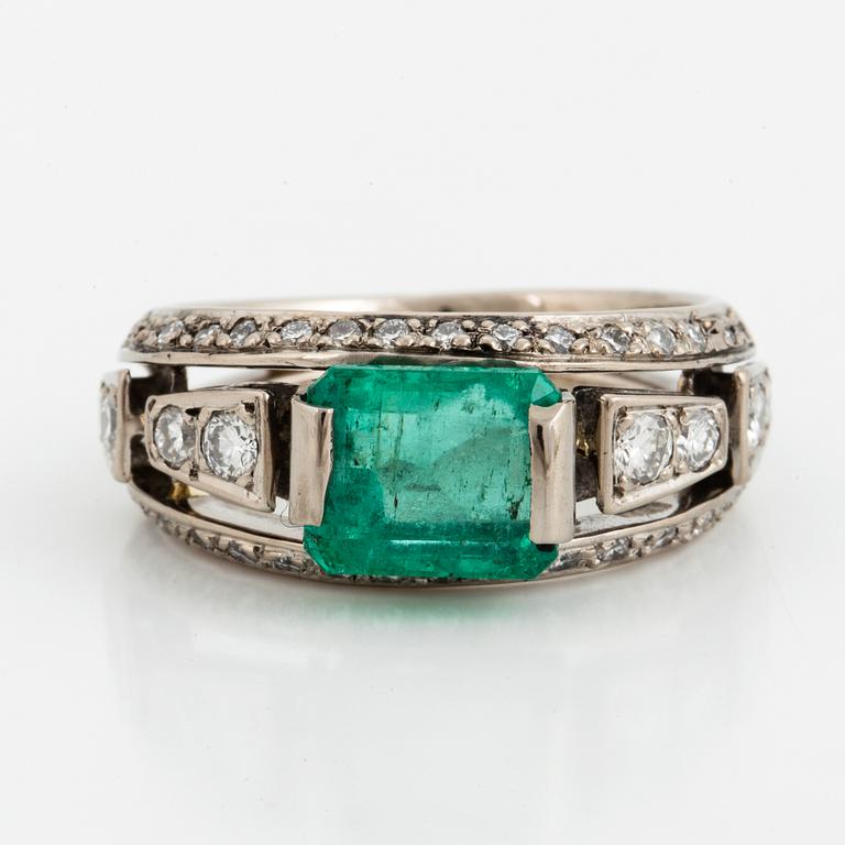 A Mandelstam emerald and diamond ring.