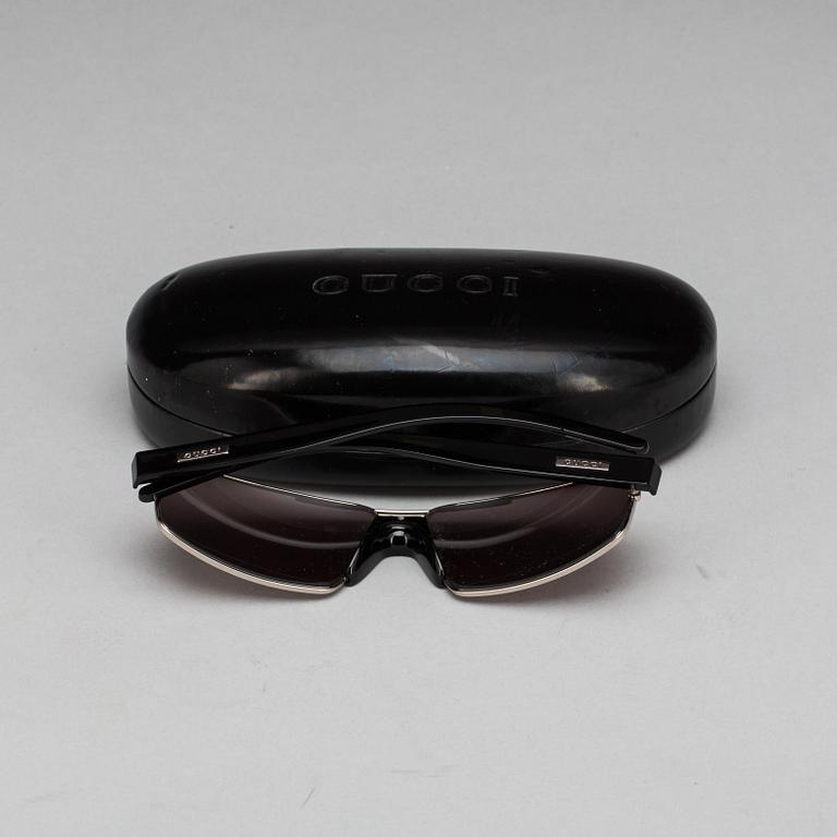 SOLGLASÖGON, Gucci.