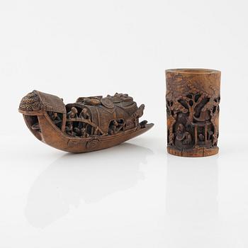A Chinese carved bamboo brush pot and boat, early 20th Century.