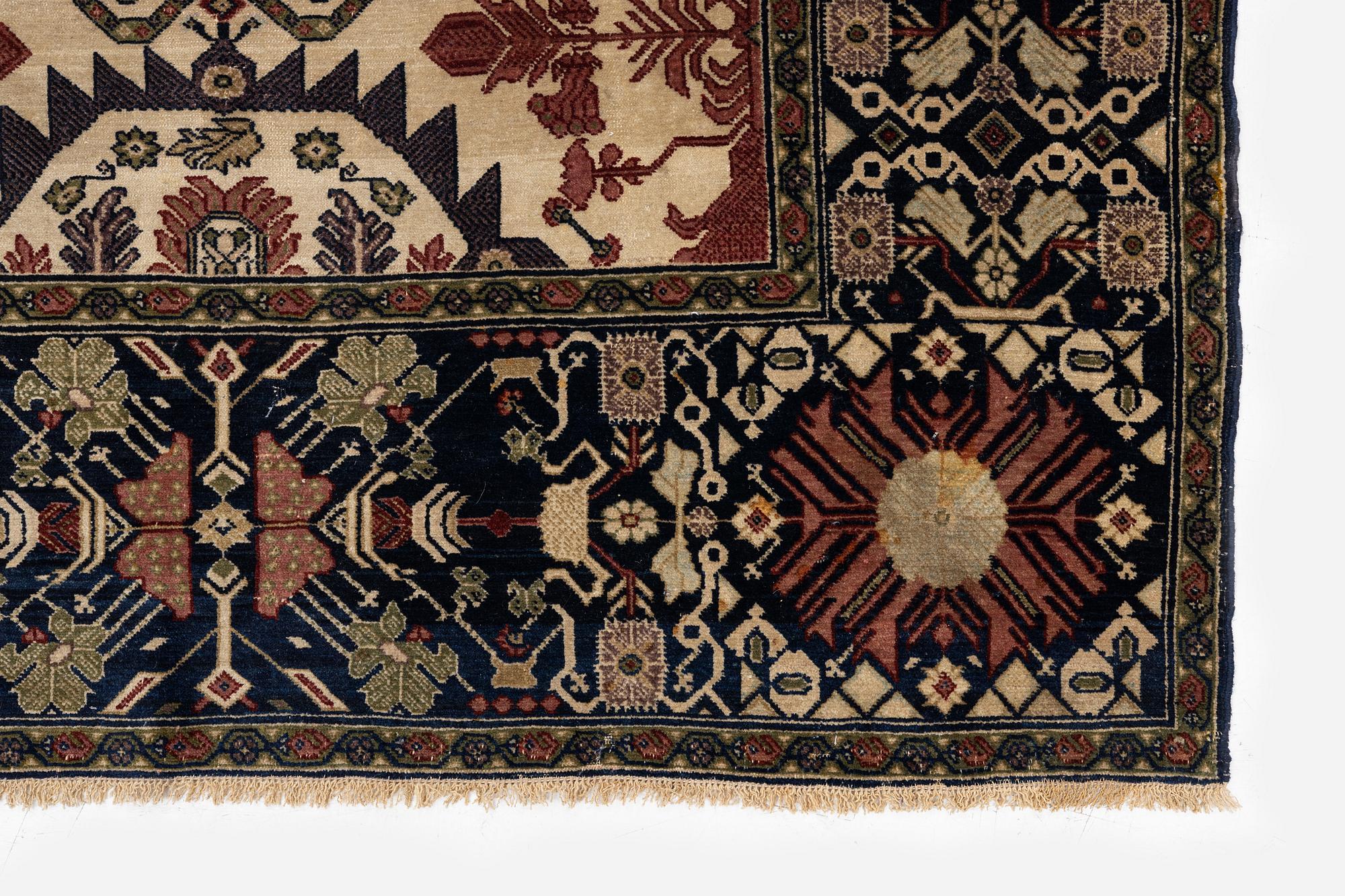 An antique Malajir rug, c. 179,5 x 124 cm (as well as one end with 2.5 cm flat weave).