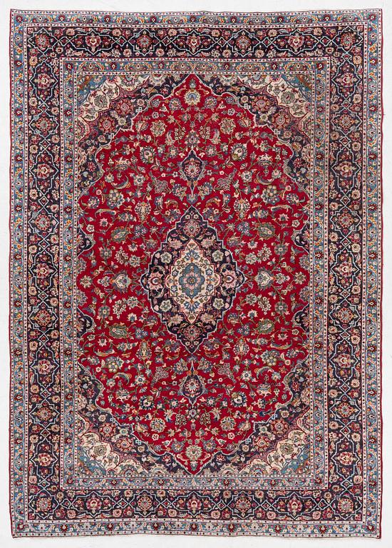 An oriental carpet, a. 419 x 295 cm.