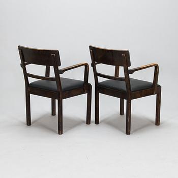 A pair of 1930's armchairs.