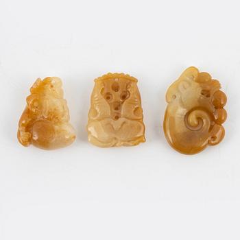 Three stone pendants, China, 20th century.