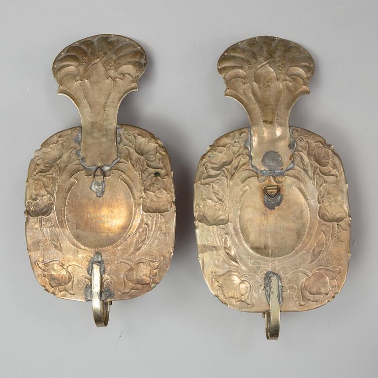 A pair of metal Baroque style wall sconces signed Elmgren, Borås, early 20th Century.
