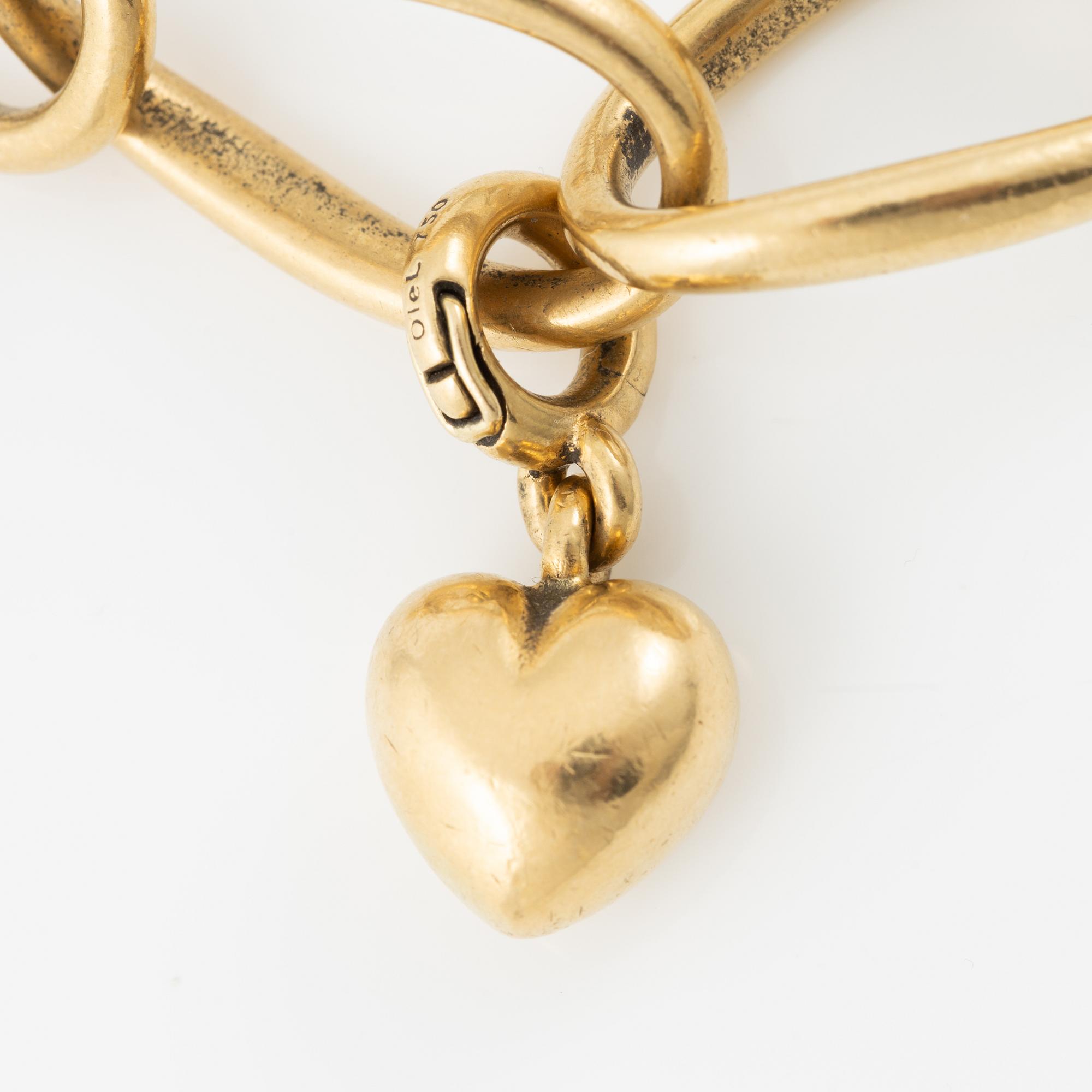 Charlotte Lynggaard, Ole Lynggaard, armband, 18K guld med berlocker i form av elefant, stjärna och hjärta.