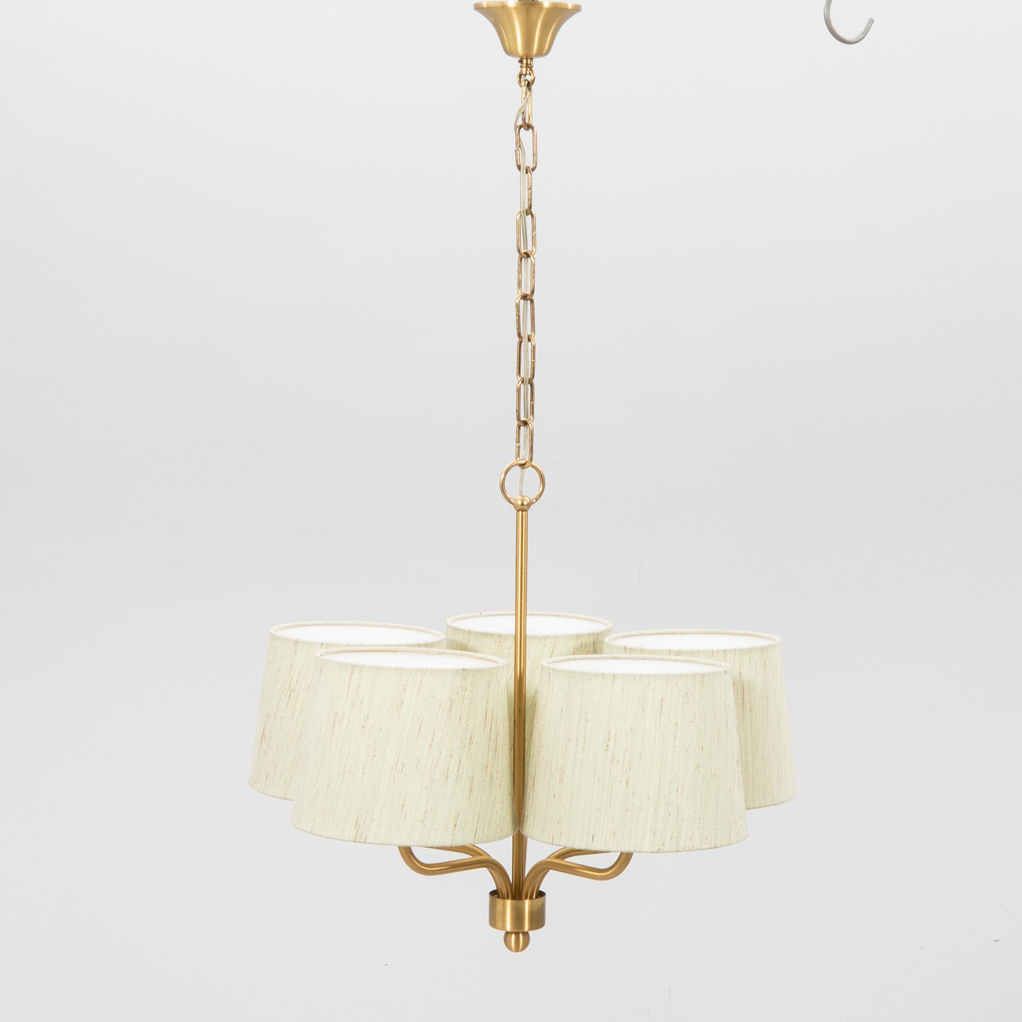 A 1960s Luxus brass ceiling pendant.