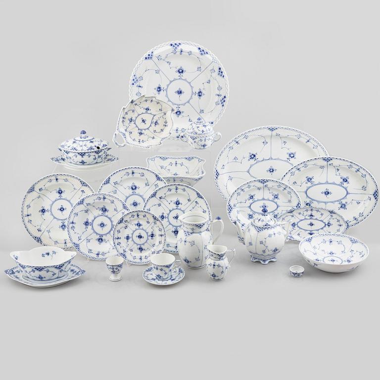 Royal Copenhagen, a 116-piece 'blue Fluted' porcelain dinner and coffee service, half lace, Denmark, mostly 1923-34.