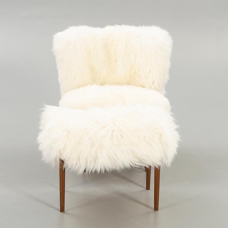 Armchair and footstool, 1950s-1960s.