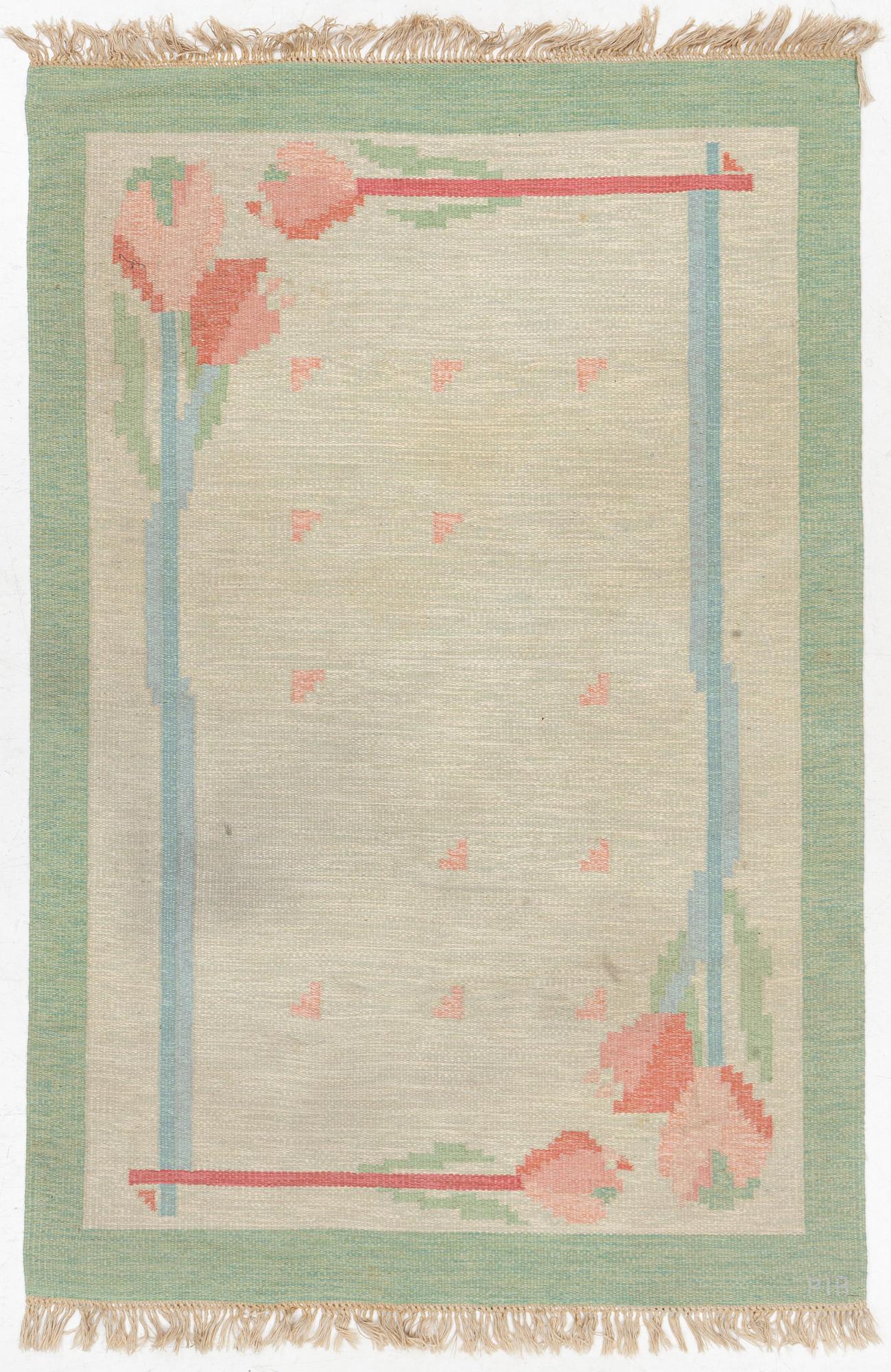 A flat weave carpet, signed PIA, c. 244 x 163 cm.
