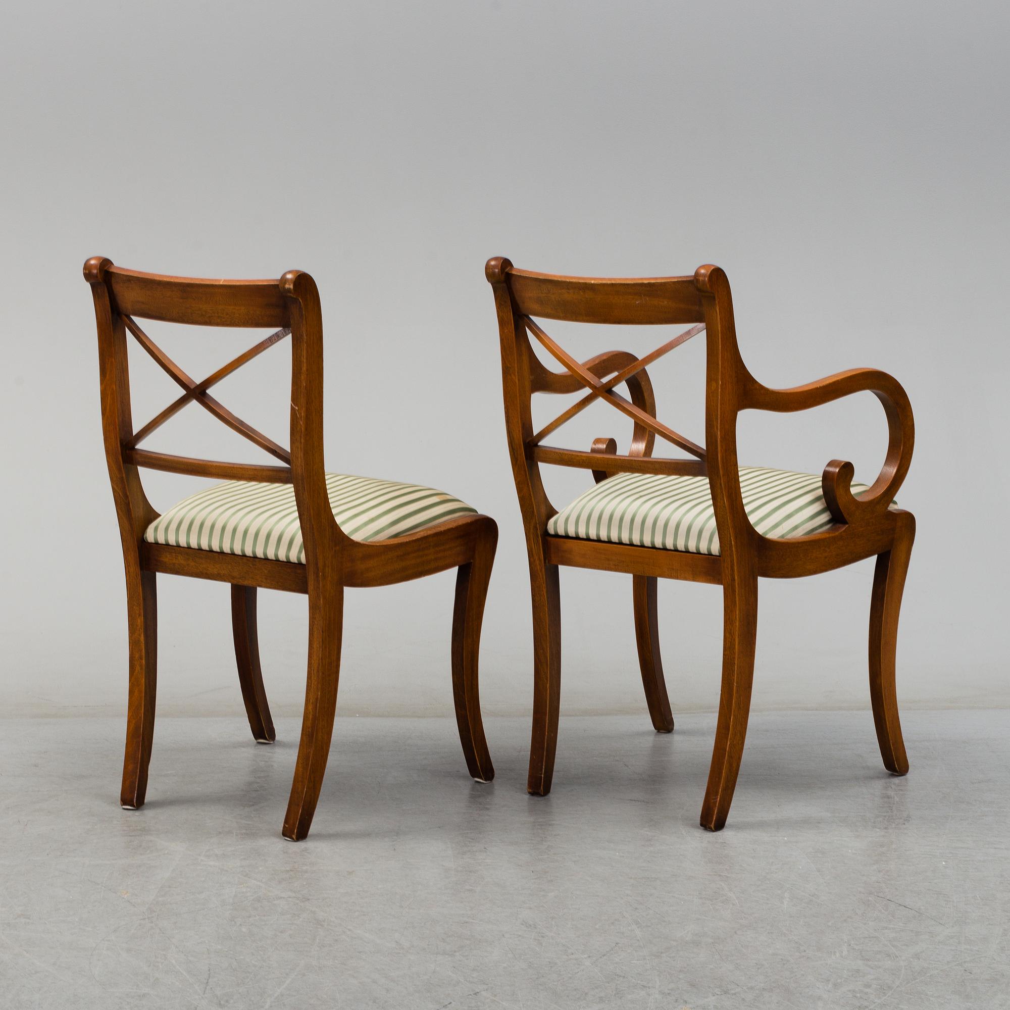 A late 20th century English style dining table and six chairs.