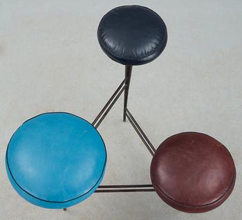 A 1950's black lacquered iron and leather stool, possibly Italy.