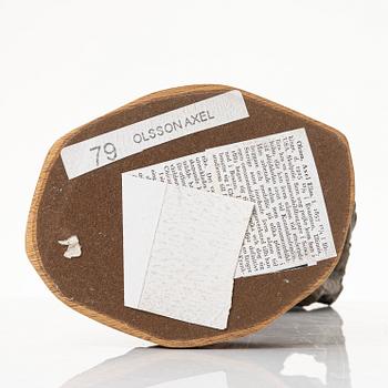 Axel Olsson, manlig gestalt med säck.