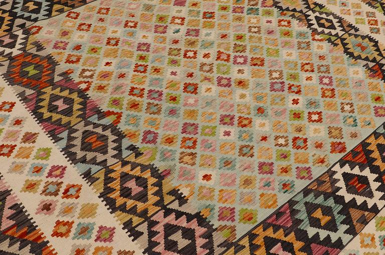 A carpet, Kilim, ca 304 x 263 cm.