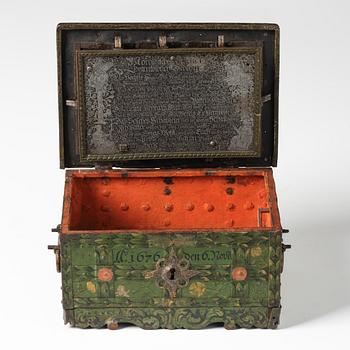 A Baroque South German engraved and polychrome-painted iron and steel strongbox, later part of the 17th century.