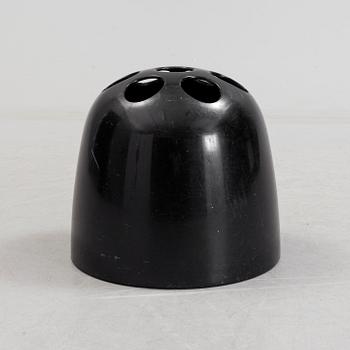 EMMA GISMONDI SCHWEINBERGER, a 'Dedalo' plastic umbrella stand from Artemide, Milan, Italy.