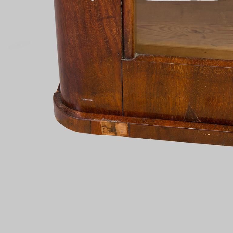 A 1830s/40s mahogany book case cabinet.