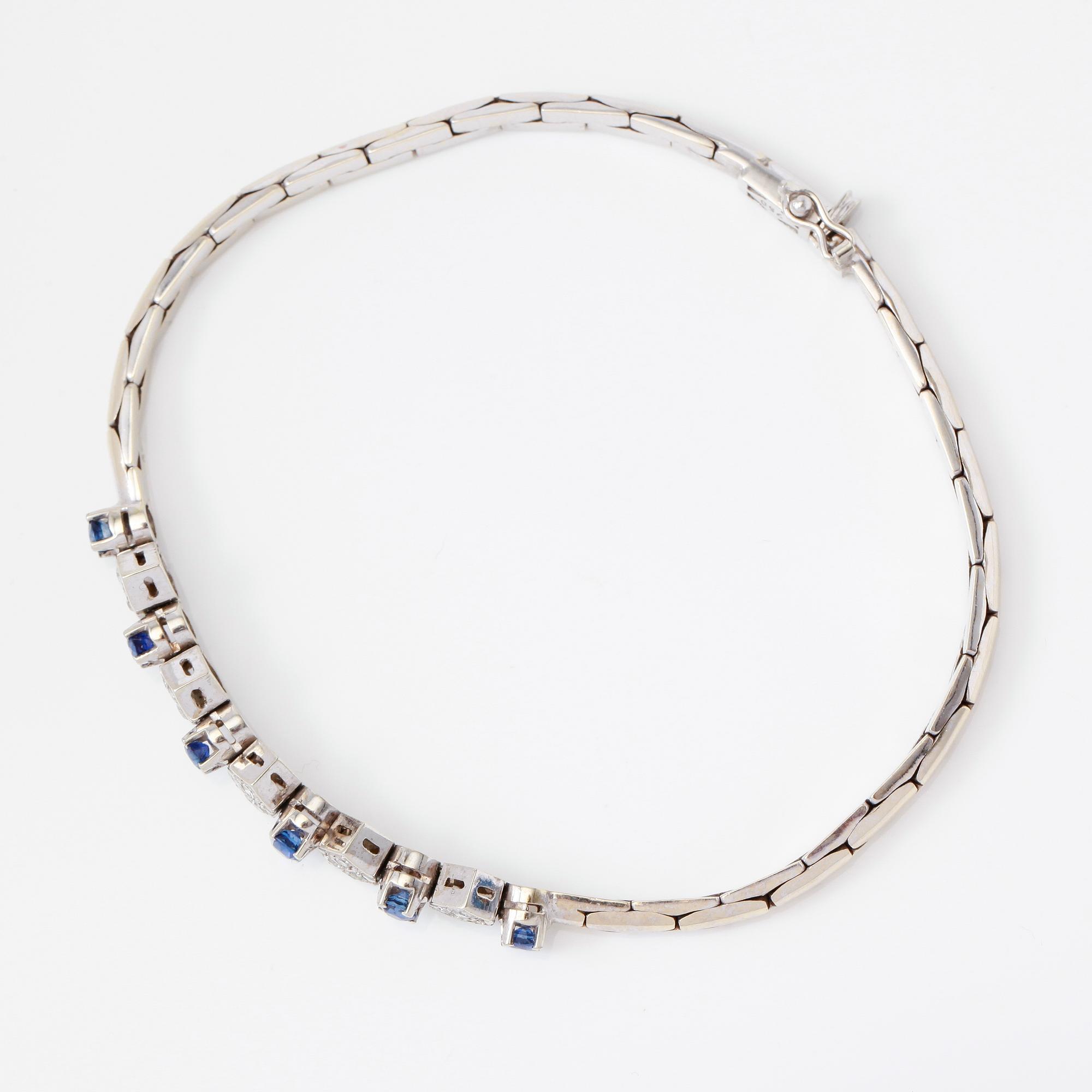 ARMBAND, 18K vitguld, diamanter och safirer.
