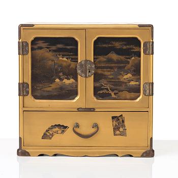 A Japanese lacquered cabinet, Meiji period (1868-1912).