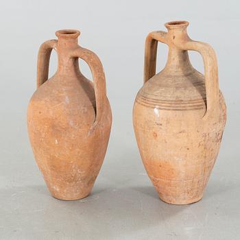 Two European earthenware jars from the first half of the 20th century.