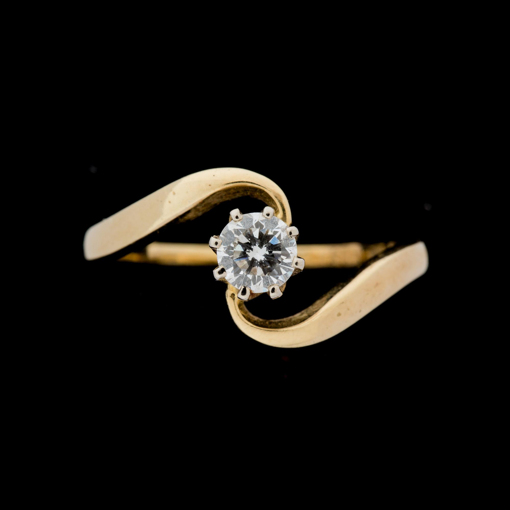 RING, 14 k guld med briljantslipad diamant ca 0,30 ct. Vikt ca 2 g.