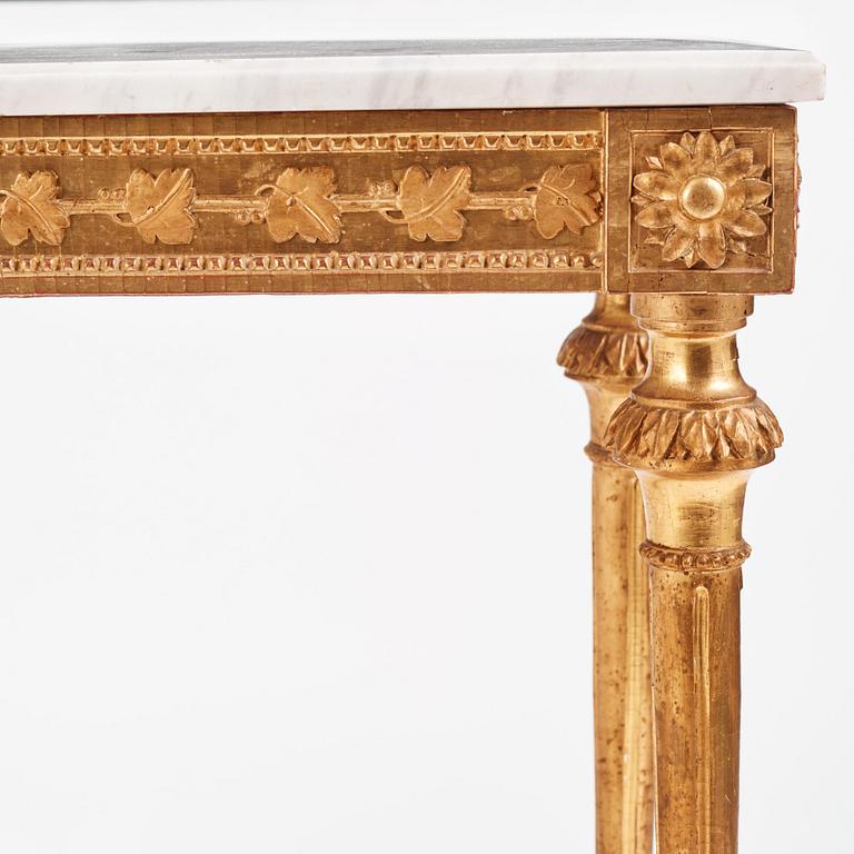 A Gustavian carved giltwood and marble console by O. C. Lindmark (master in Stockholm 1779-1813).