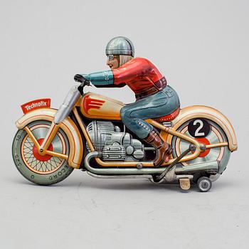 A Technofix tinplate Trick motorcycle, Germany, ca 1950.