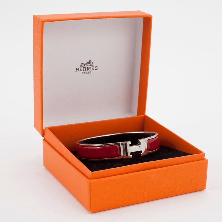 HERMÈS, a red enameled bracelet, "Clic H".