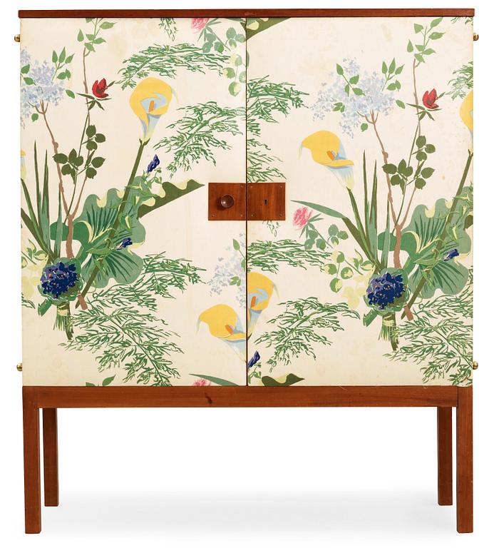 A Josef Frank mahogany cabinet, the doors and sides upholstered with floral chintz fabric, Svenskt Tenn 1940's-50's.