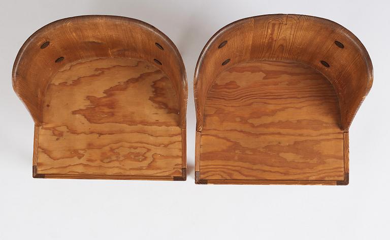Axel Einar Hjorth, a pair of "Lovö" stained pine armchairs, Nordiska Kompaniet 1930s.