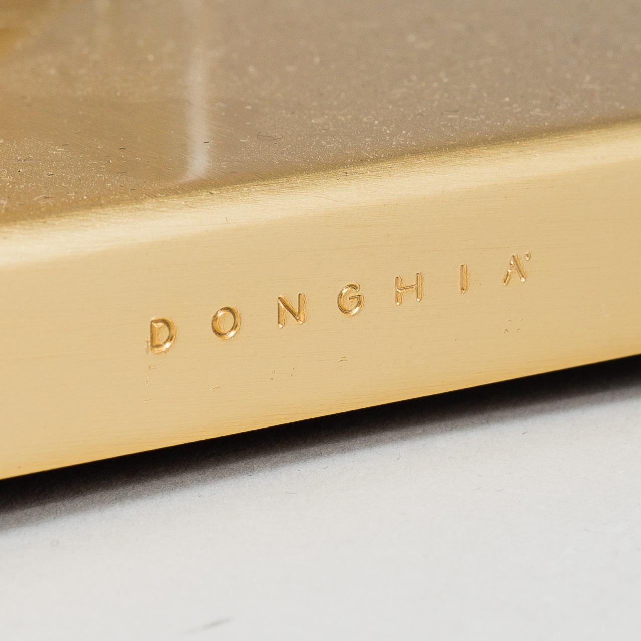 A 'Esha Alta' glass and brass table lamp from Donghia lightning.
